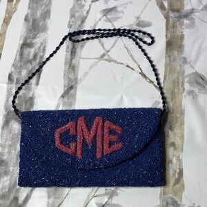 Snappy Turtle Moyna Raised Monogram Clutch: Crossbody